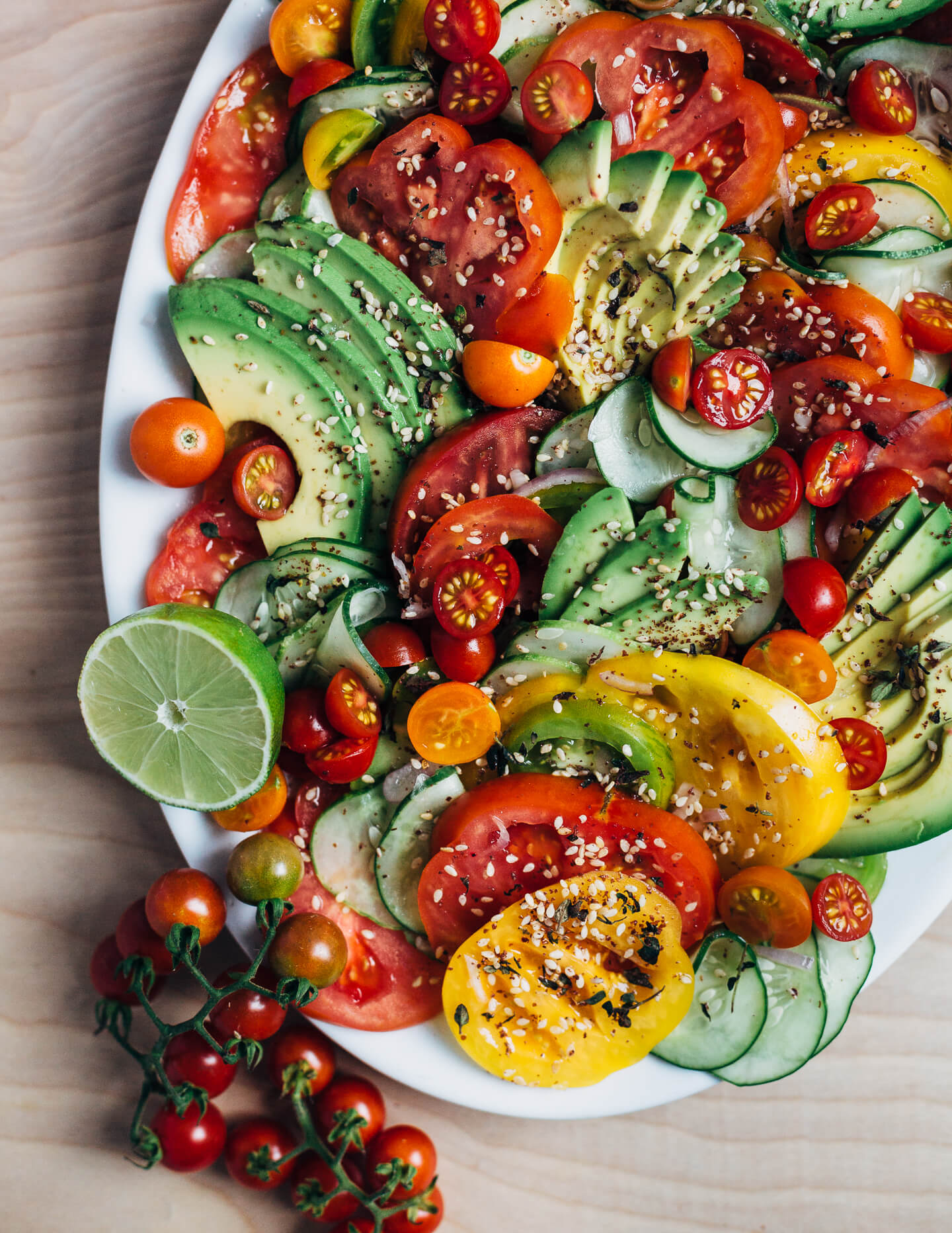 We're celebrating a decade of Brooklyn Supper with a summery avocado and tomato salad sprinkled with lime juice and fresh za'atar. 