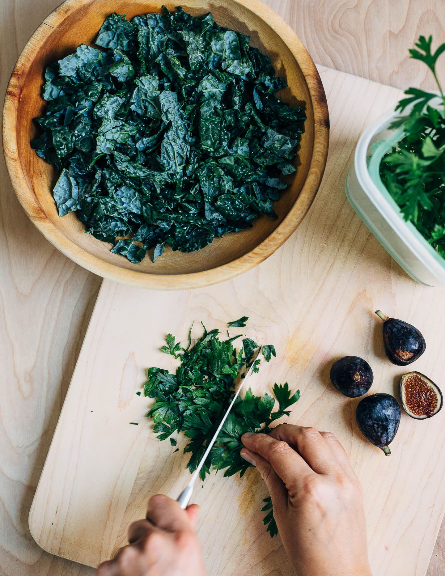 This nutty toasted farro salad features al dente farro tossed with massaged kale and ruby-hued fresh figs topped with creamy goat cheese crumbles and fresh parsley.