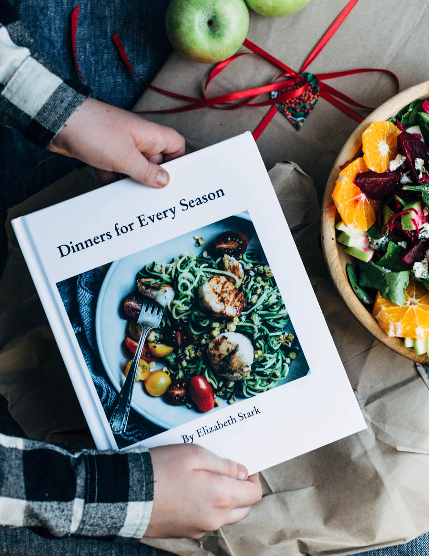 A bright and crunchy green apple and beet salad recipe featuring sliced green apples, marinated beets tossed with red wine vinegar and shallot, beet greens, spinach, herbed goat cheese crumbles, and a simple vinaigrette. 