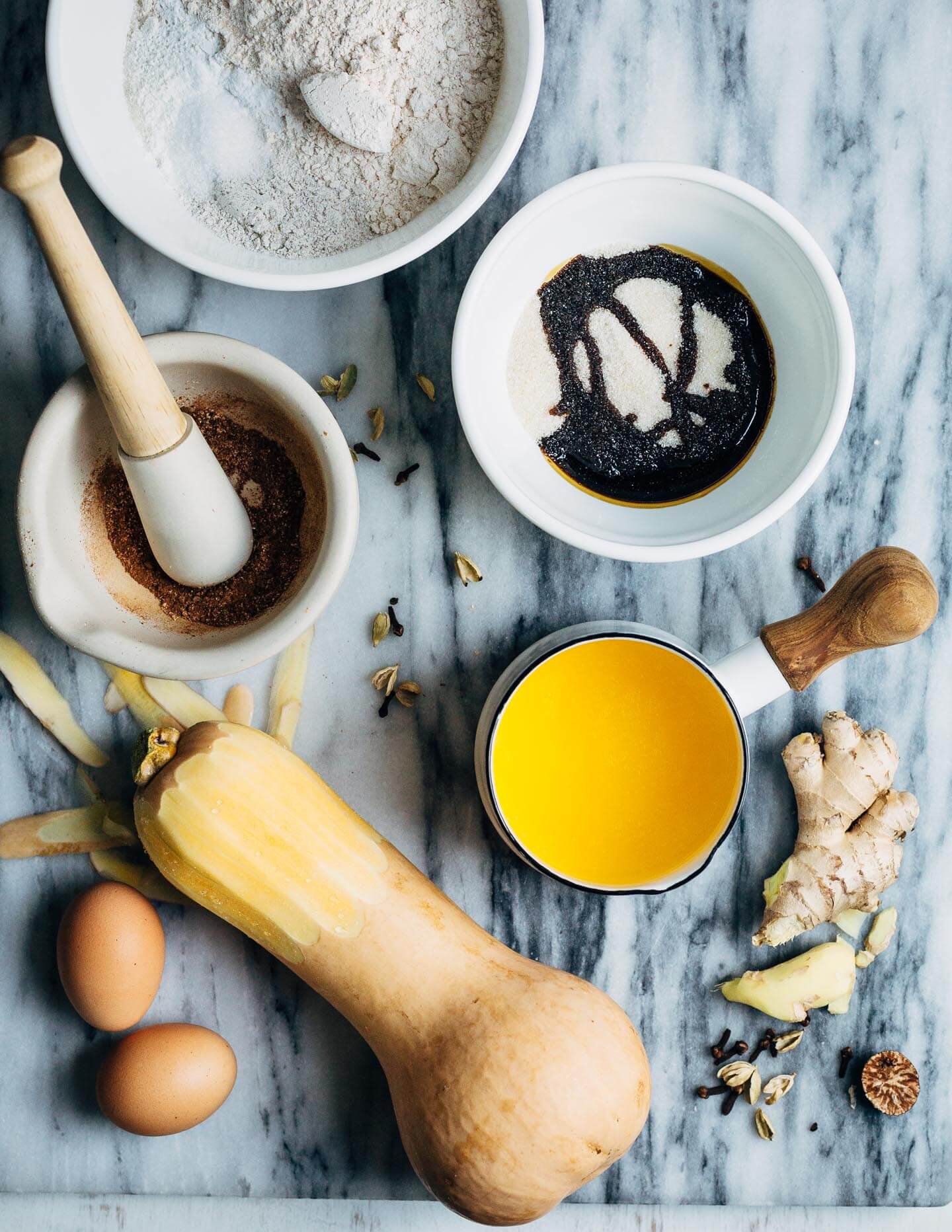 Deliciously tender, impossibly springy butternut squash muffins suffused with fresh ginger, cardamom and cloves. 