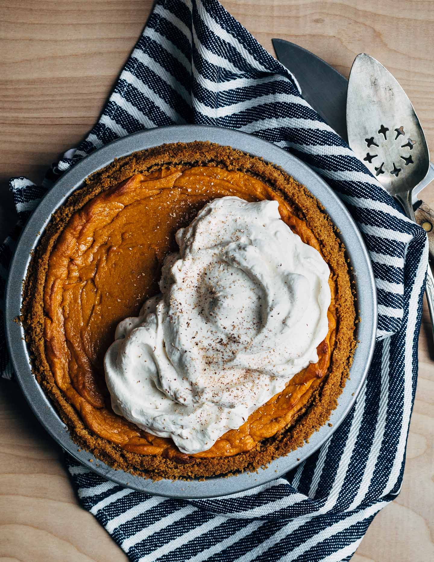 End your Thanksgiving feast with this light and silky bourbon-spiked sweet potato pie baked in a classic graham cracker crust and topped with a big dollop of brown sugar whipped cream. 