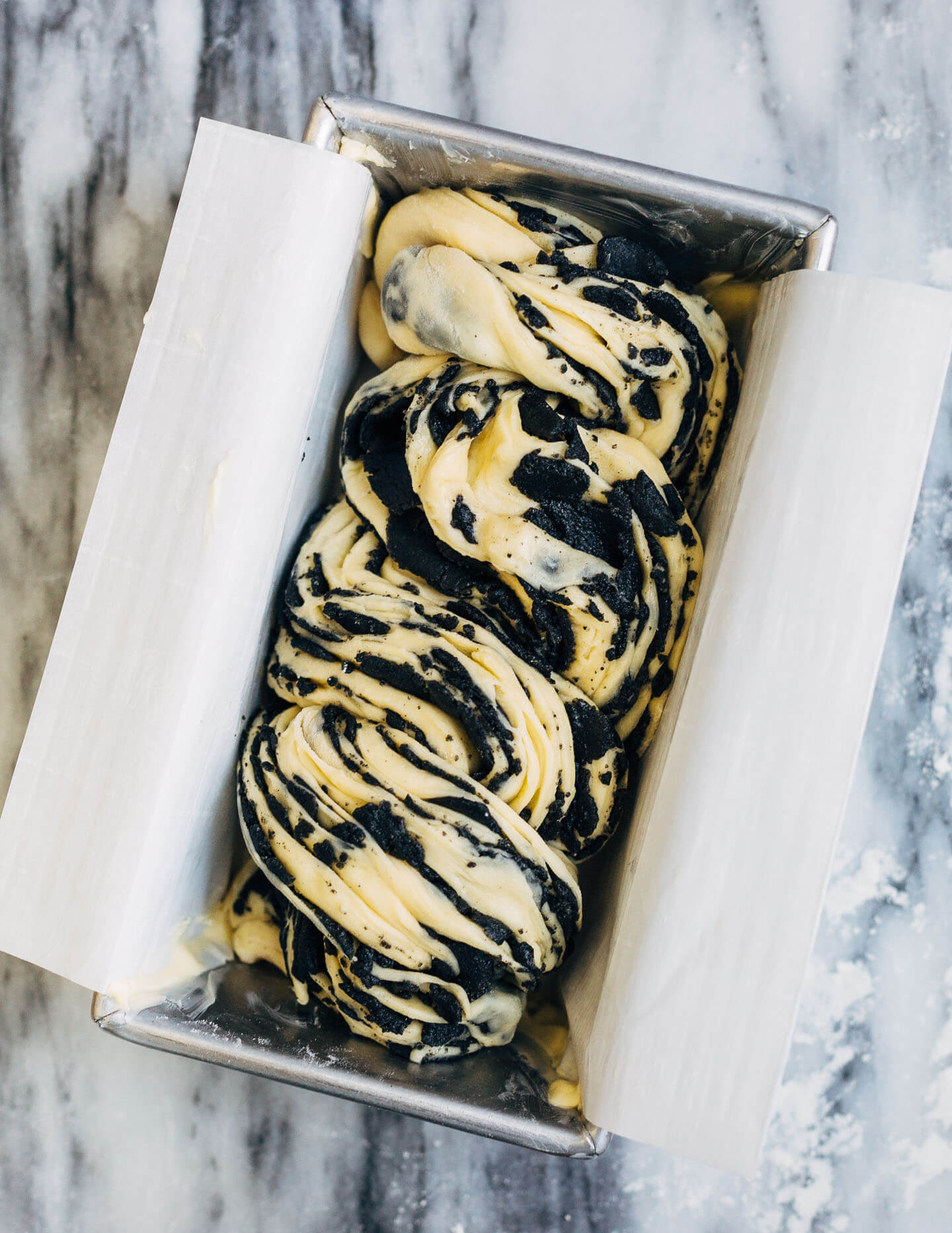 A sweet and pillowy yeasted twist bread recipe with nutty swirls of black sesame paste, from A Common Table by Cynthia Chen McTernan.