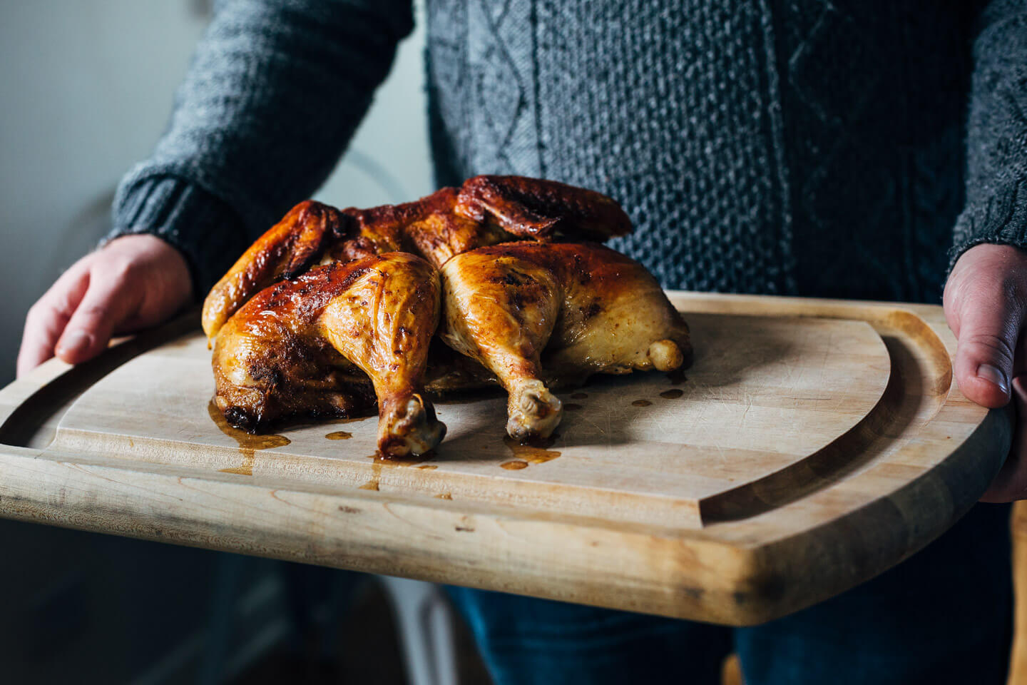 A simple and delicious holiday feast featuring crispy roasted spatchcock chicken with buttery sheet pan smashed potatoes and Brussels sprouts. 