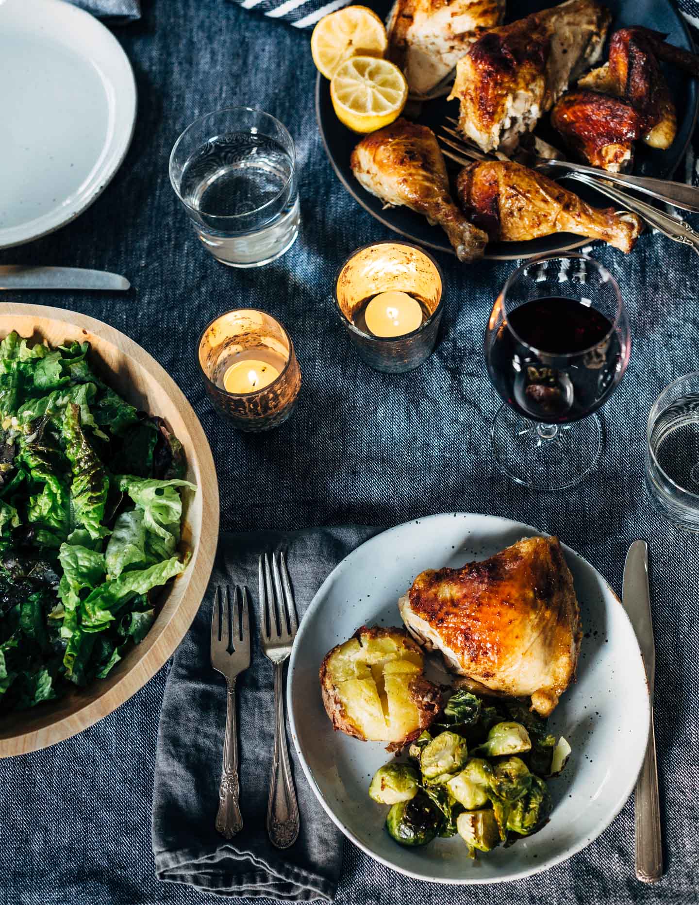 A simple and delicious holiday feast featuring crispy roasted spatchcock chicken with buttery sheet pan smashed potatoes and Brussels sprouts. 