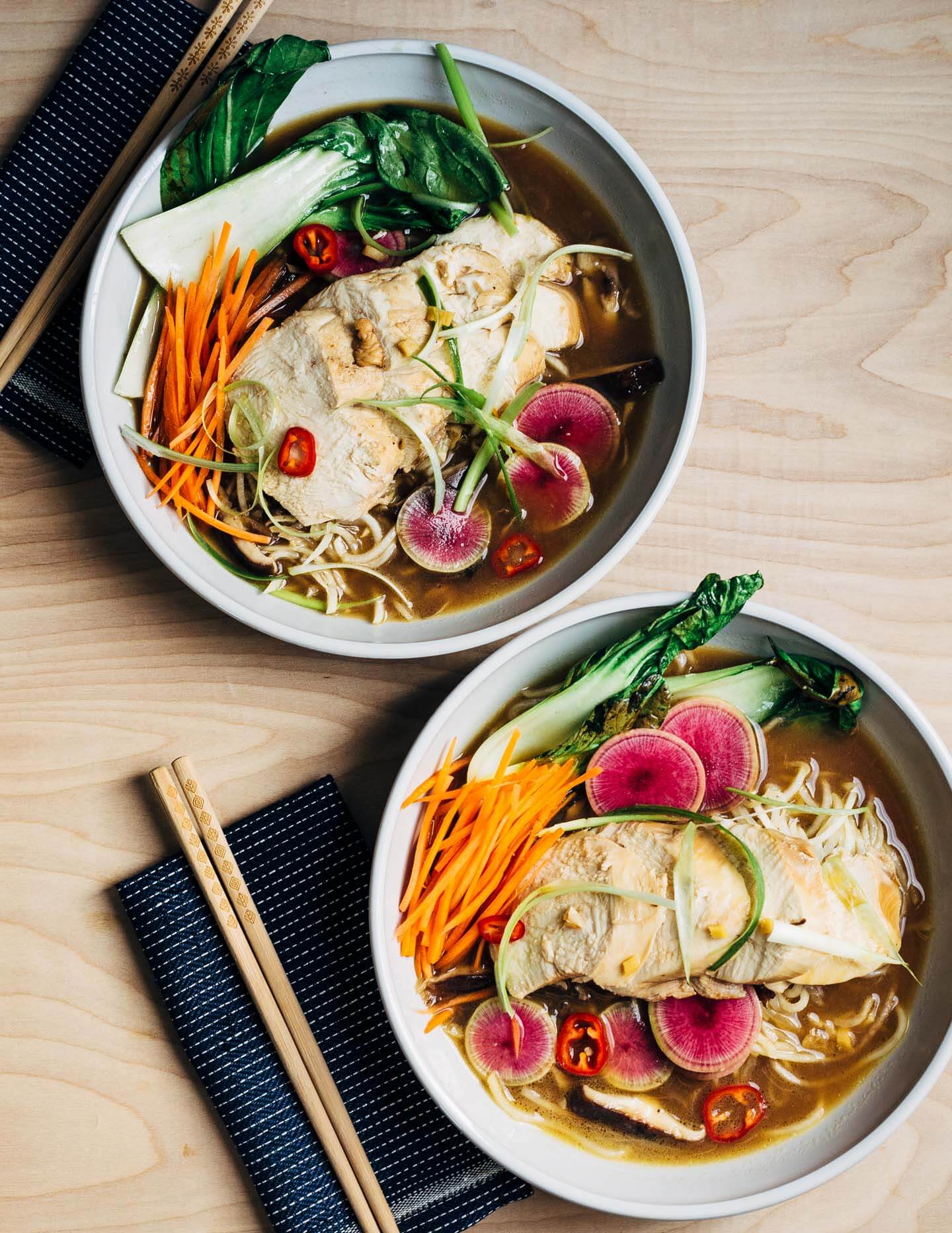 A restorative turnip noodle ramen recipe featuring tender turnip noodles and a host of winter vegetables served in a rich ramen broth topped with juicy, flavorful steamed chicken breasts. Recipe is naturally gluten-free and includes a simple Whole30-compliant variation.