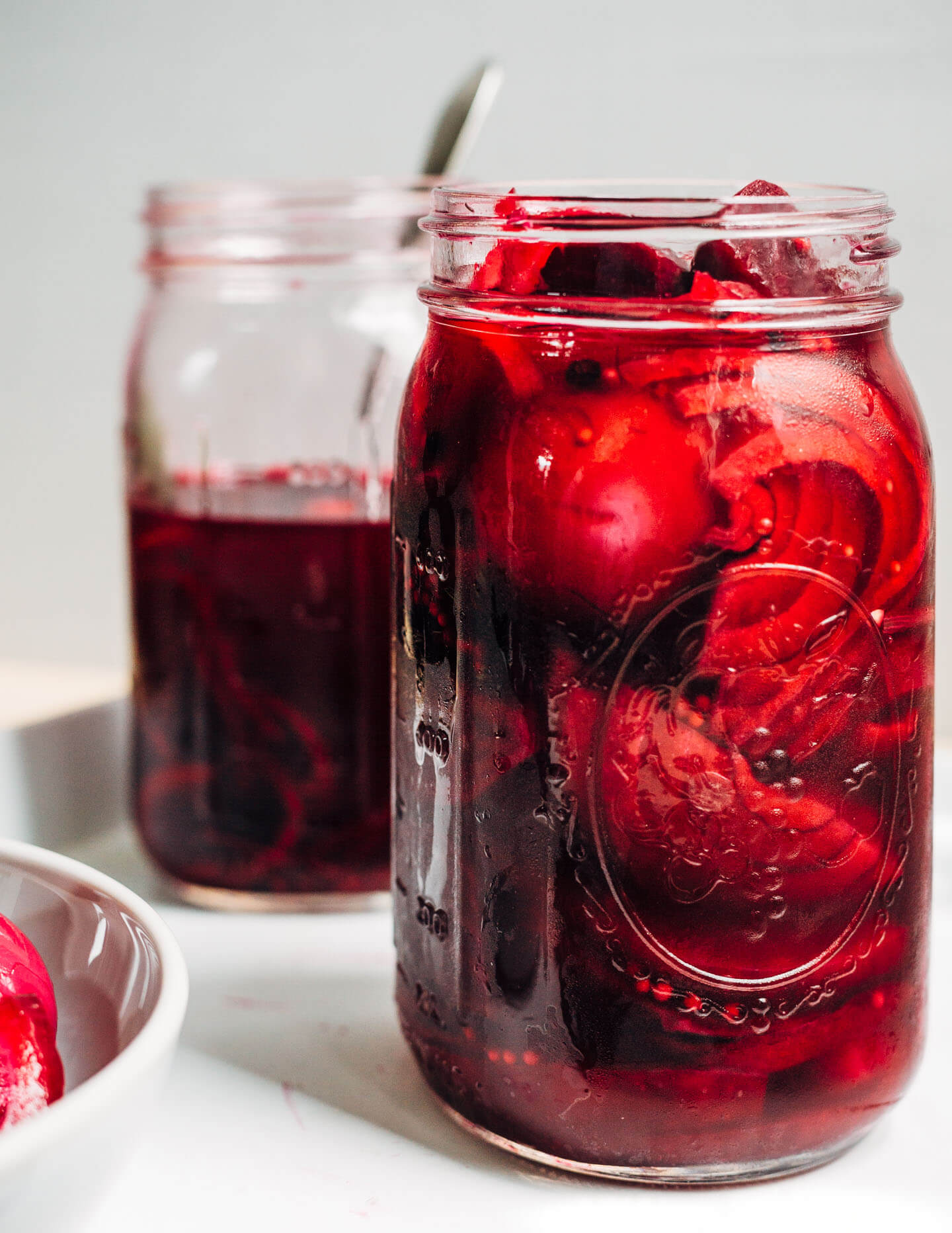 Extremely pink beet-pickled eggs aren't just beautiful, they're suffused with a richly flavored sweet and sour brine that pops with every bite. Serve the eggs alongside the pickled beets and red onions, and top with a dollop of sour cream and horseradish sauce and fresh garden herbs.