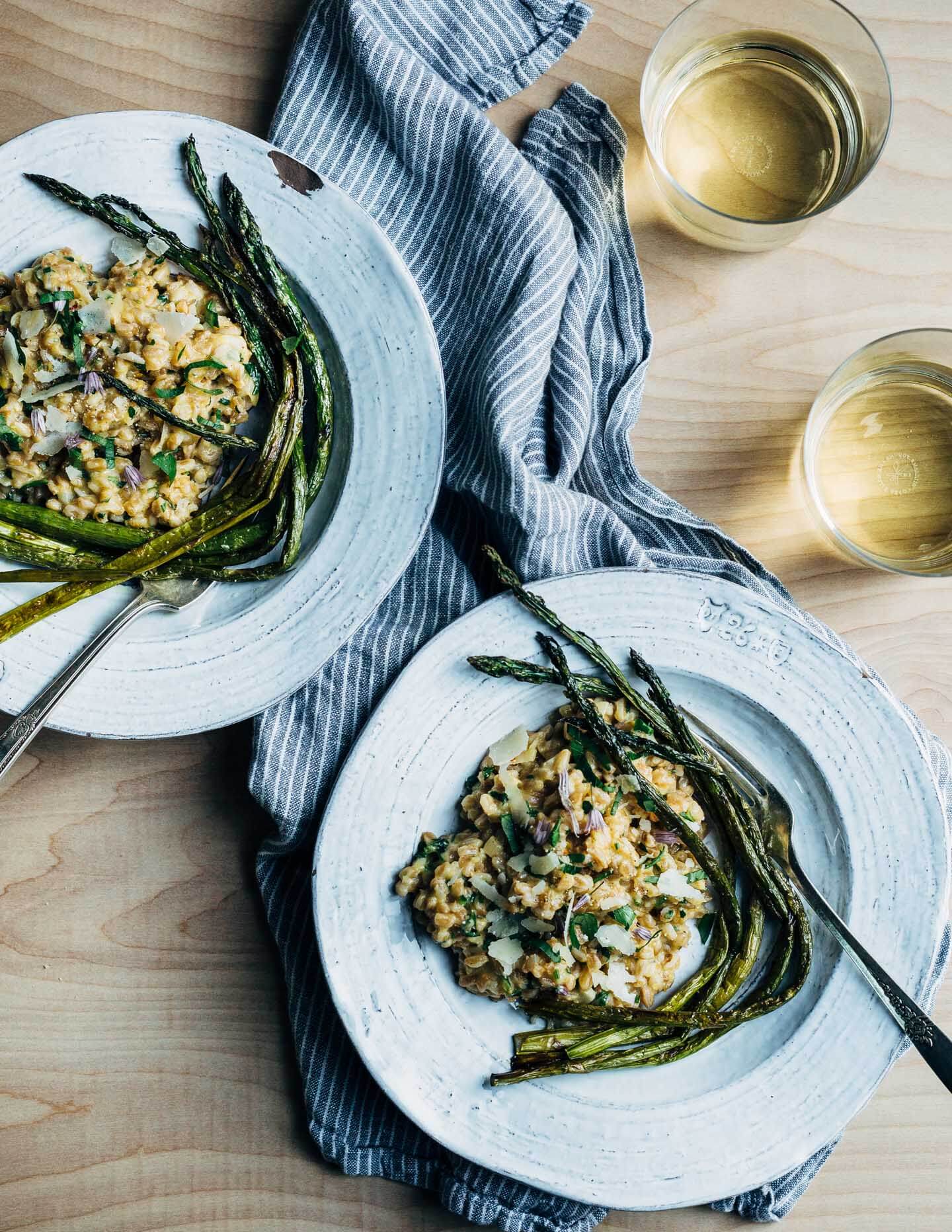 Creamy farro risotto (aka farrotto) with all the best spring things like ramps, young garlic, chives, and roasted asparagus. 