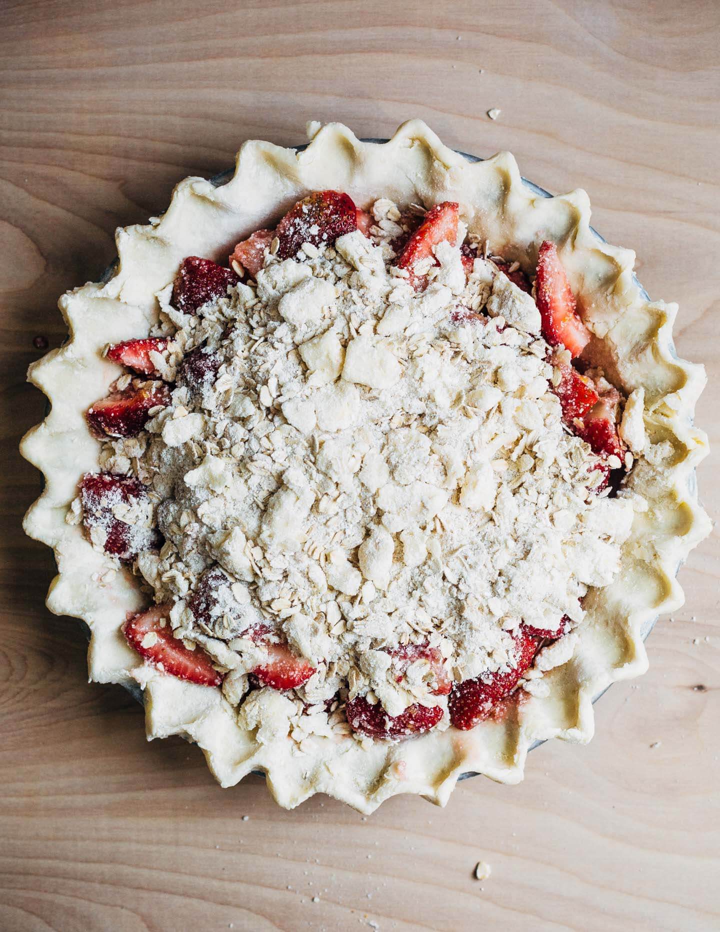 A supremely delicious strawberry crumble pie with all the jammy sweetness of in-season strawberries and a toothsome buttery oat crumble topping. 