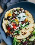 Greek-inspired lamb tacos are a revelation. They're proof that a great dinner can be as simple as sautéing meat with alliums and spices, and chopping up a few vegetables. Add a side salad and maybe some rice, and you have a simple dinner that's ready in under 30 minutes.