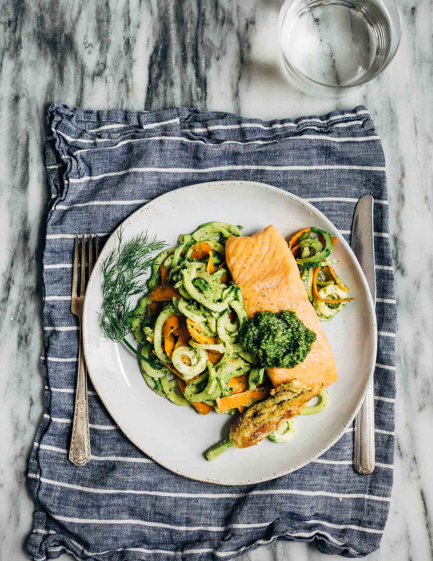A quick summer dinner: zucchini noodles with cilantro pesto and quick broiled salmon. 