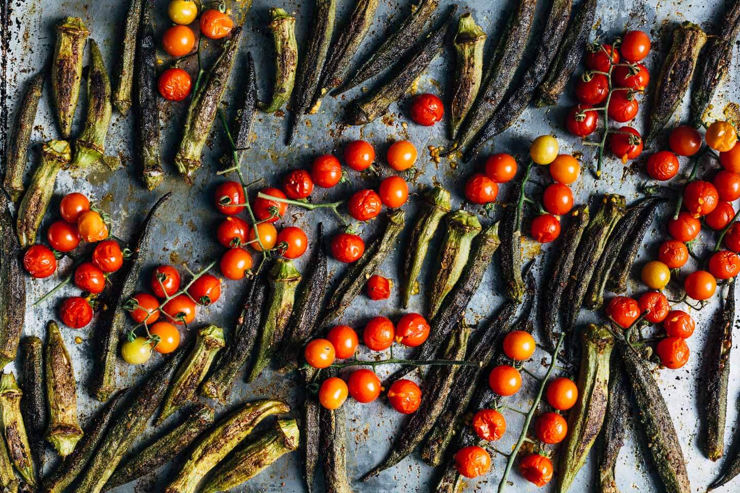 Crispy golden roasted okra and cherry tomato bunches. 