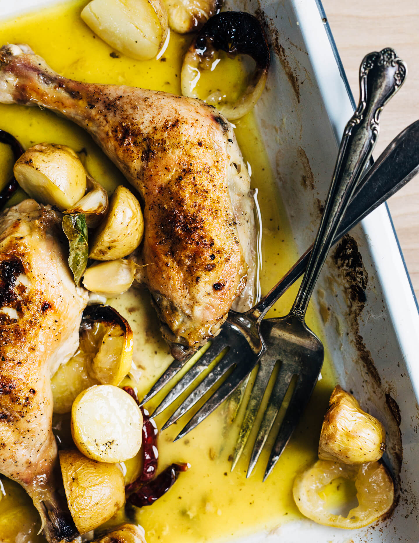 Slow-roasted whole chicken legs cooked in extra virgin olive oil. 