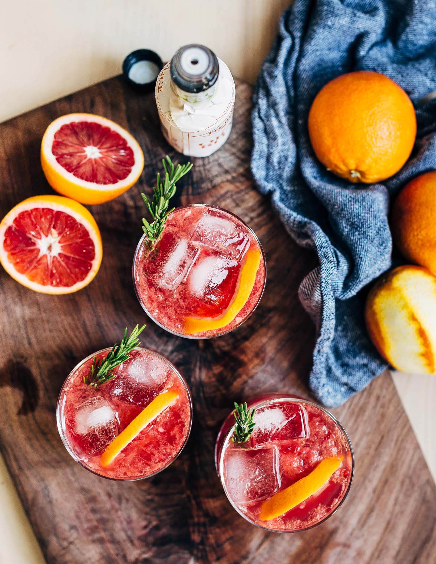 Non-alcoholic blood orange spritzers with a dash of orange bitters