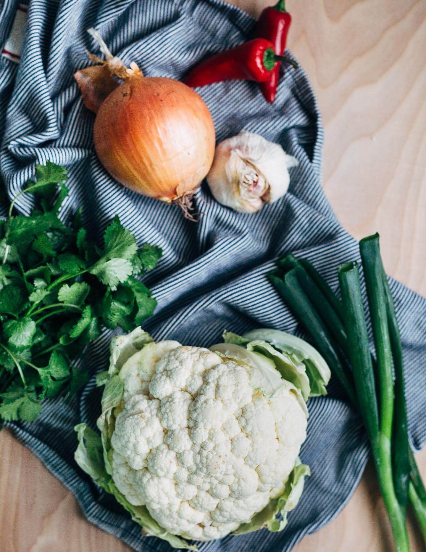 Ingredients for a simple cauliflower soup made on the stovetop. 