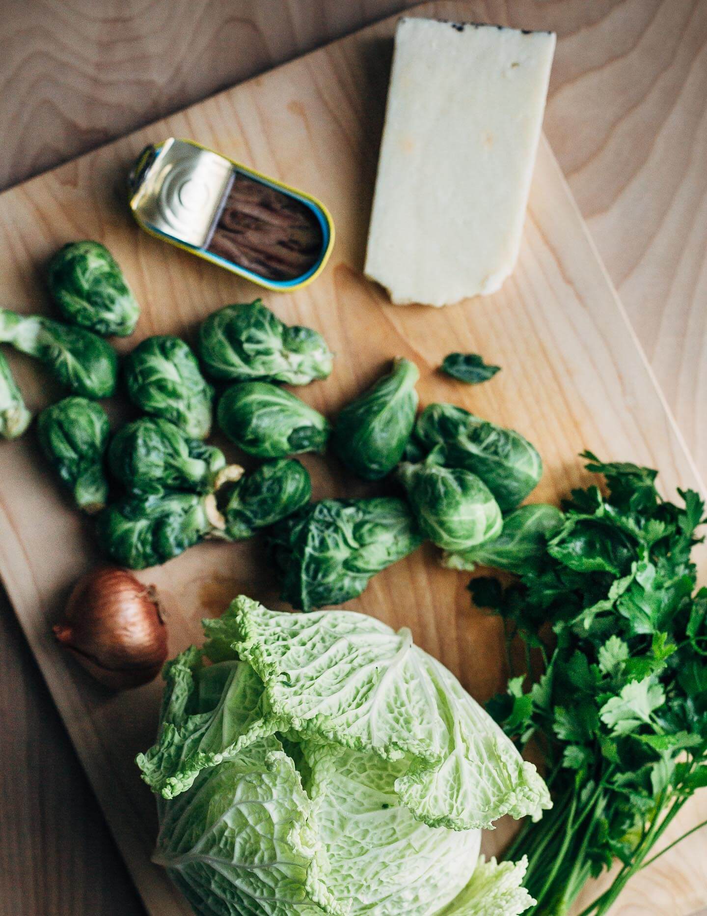 Ingredients for a quick weeknight pasta dish featuring brassicas, anchovies, and Pecorino. 