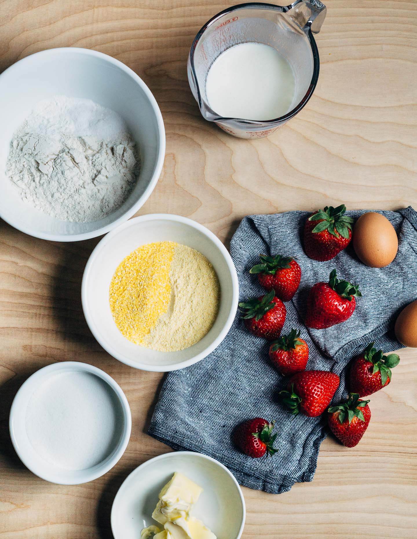 Ingredients for strawberry cornmeal cake. 