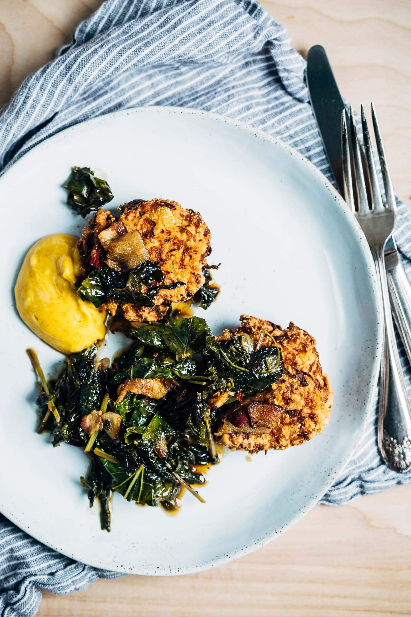 Deep fried turnip fritters topped with turnip greens. 