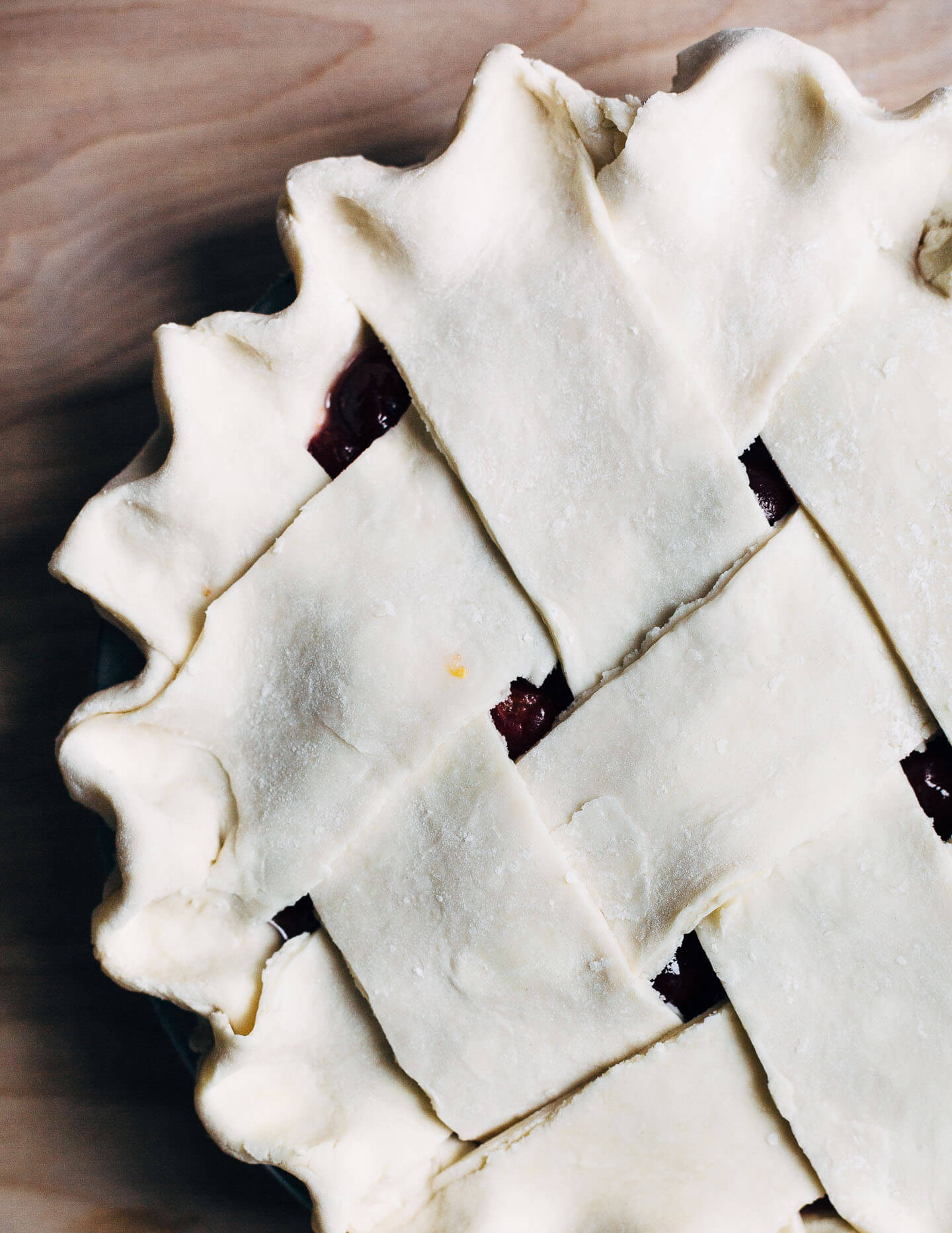 Lattice top sour cherry pie with a flaky, all butter crust, ready to bake. 