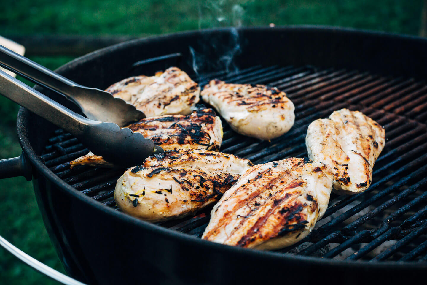 Farmer Focus chicken breasts on the grill.