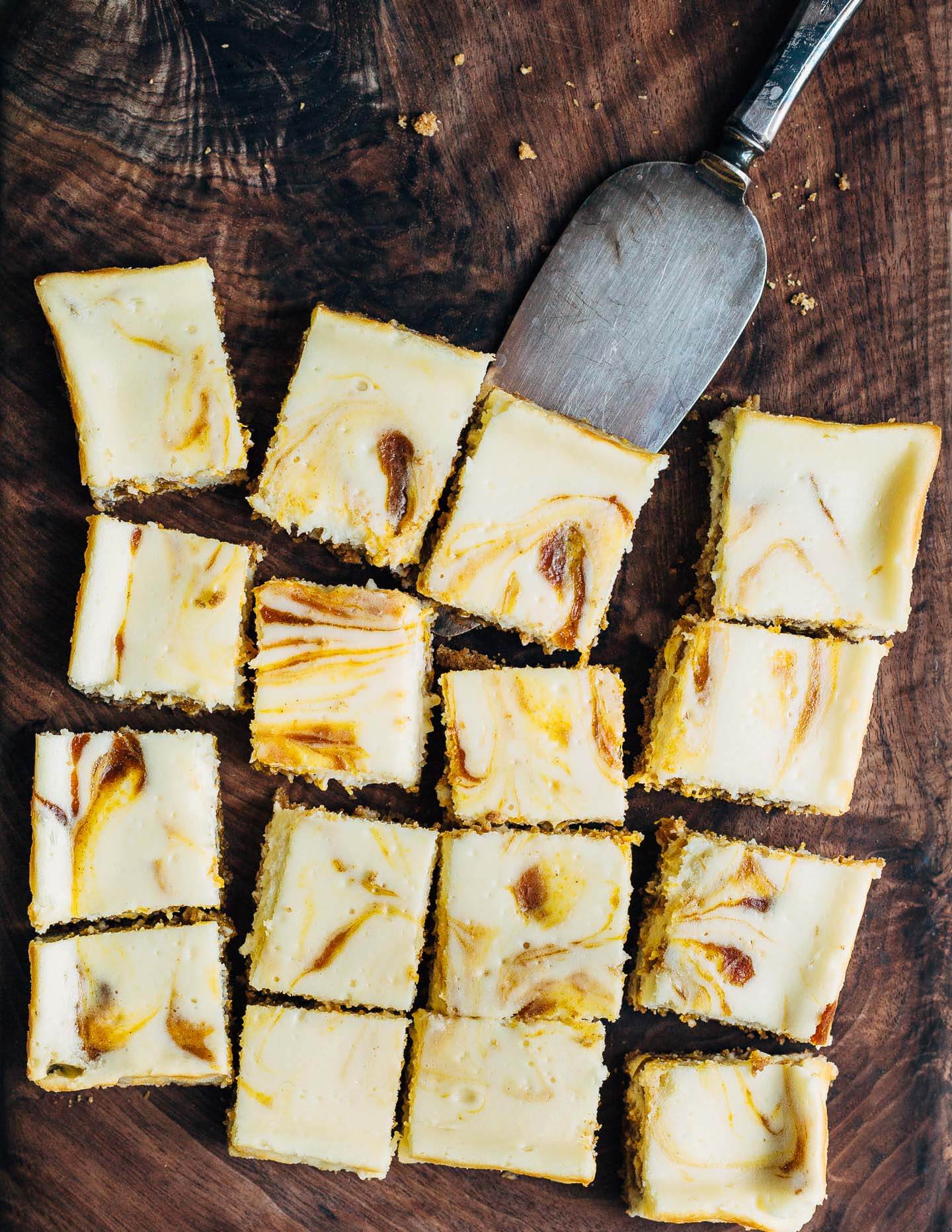 From Sarah Kieffer's new cookbook, 100 Cookies, these airy cream cheese pumpkin pie bars with a buttery graham cracker crust and spiced pumpkin pie swirls are the perfect fall treat!