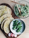 All the fixings for herbed sardine toasts: garlicky sourdough, fennel salad, and tinned sardines tossed with fresh herbs.