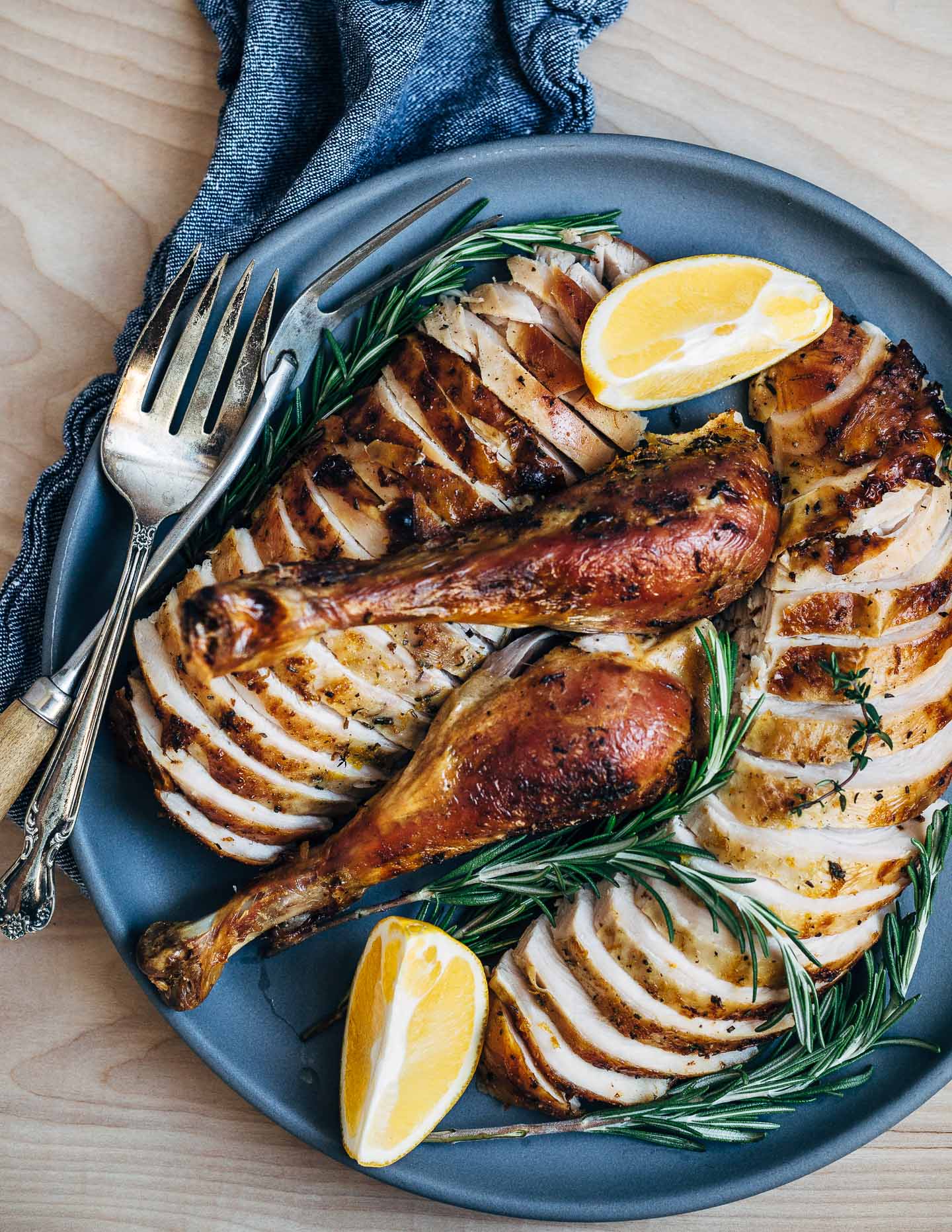 A sea salt, brown sugar, rosemary, and orange zest dry rub melds beautifully with the inherent flavor of an organic, free range broad breasted bronze turkey. This rosemary-orange roast turkey comes out of the oven with crisp, golden skin and suburb flavor.