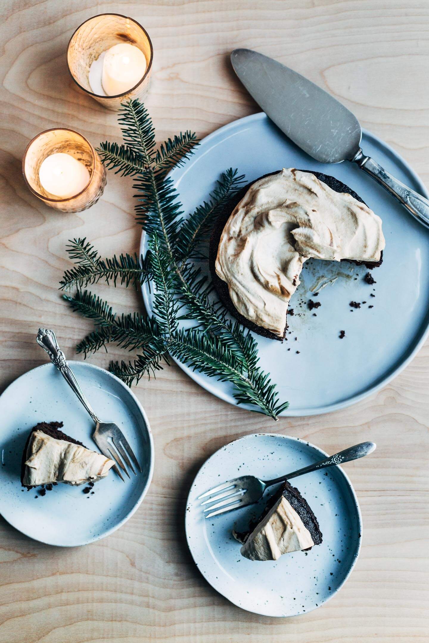 An extra gingery, perfectly spiced spelt gingerbread cake topped with pillowy molasses whipped cream.