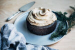 An extra gingery, perfectly spiced spelt gingerbread cake topped with pillowy molasses whipped cream.