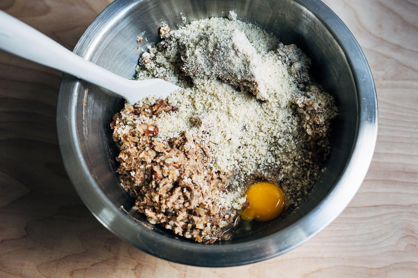 Mixing the veggie burgers. 