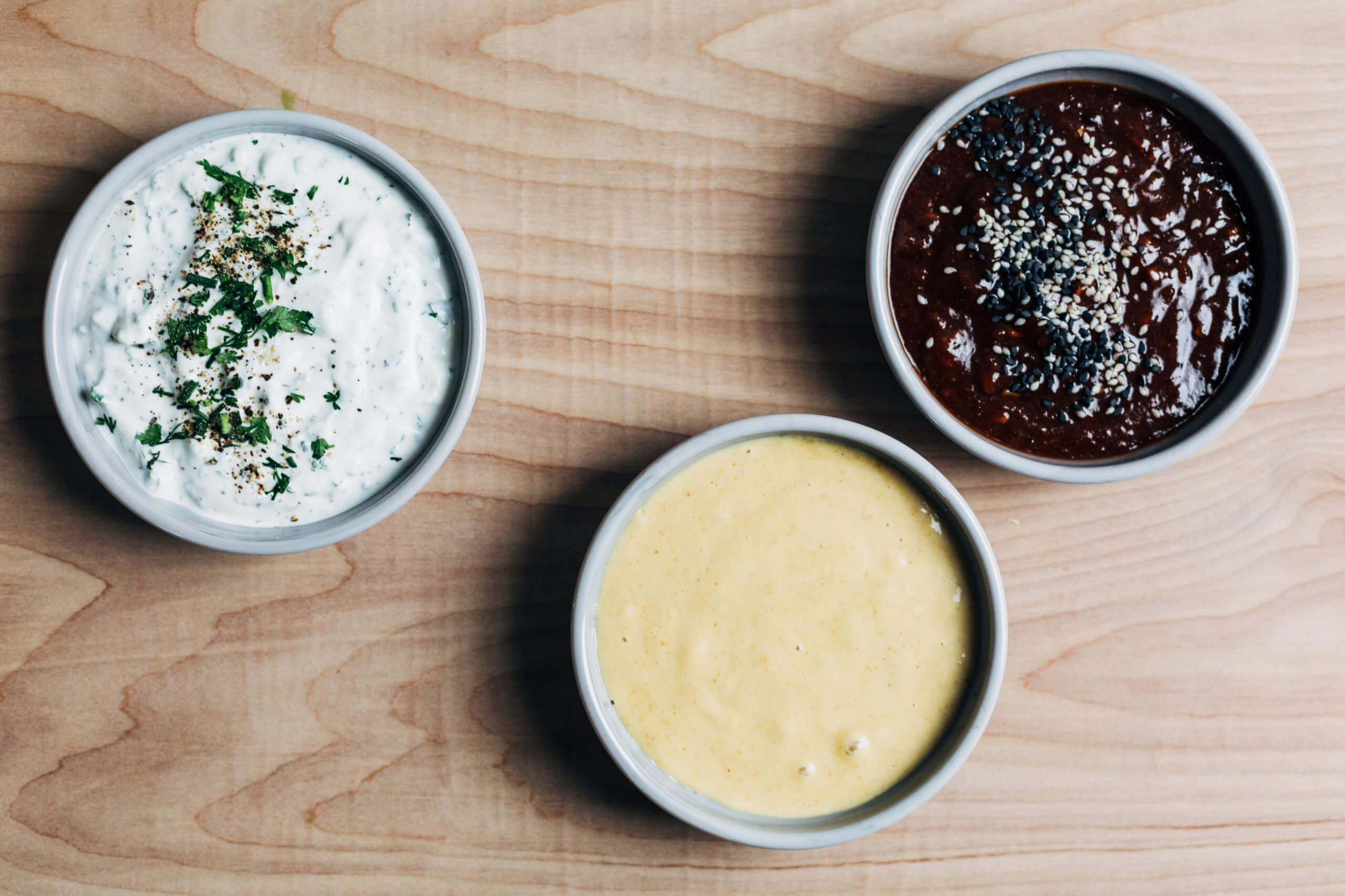 Dips and sauces for a chicken tenders board.