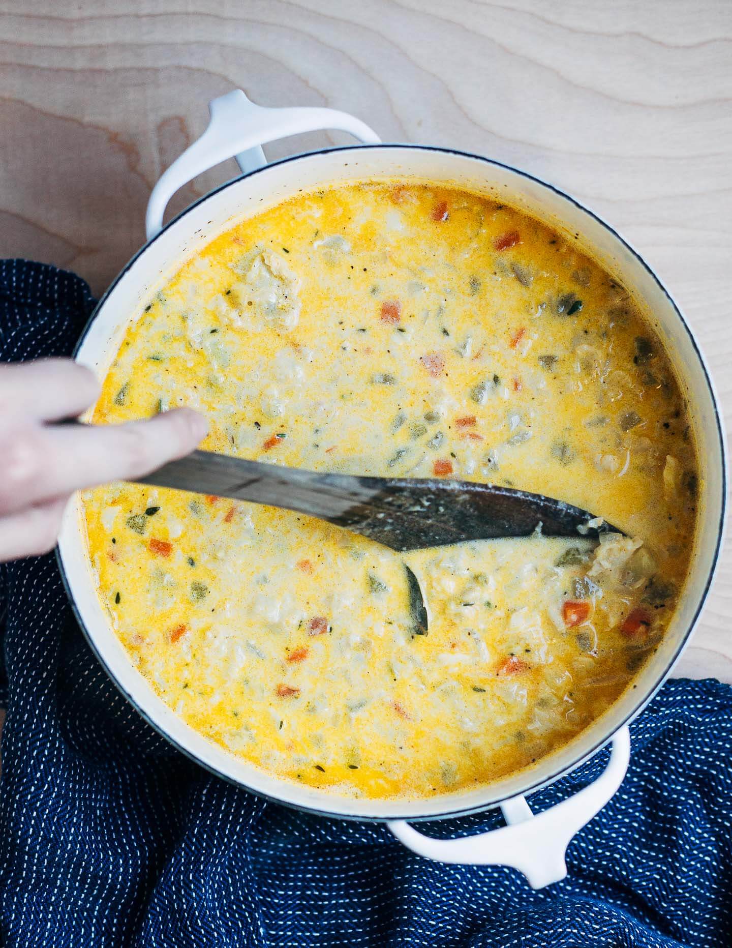 Stirring the seafood chowder