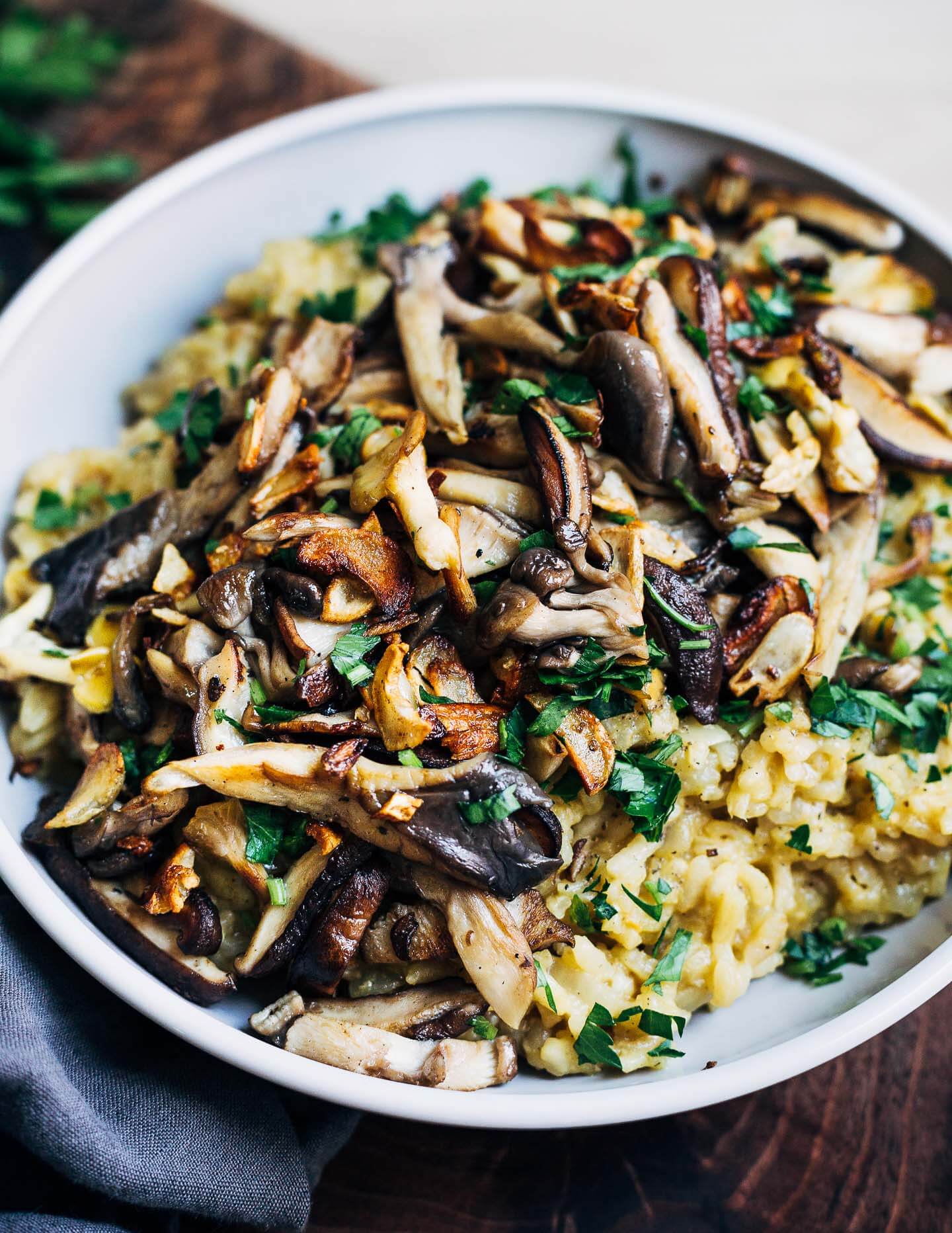This creamy, umami-rich vegan risotto is made in an Instant Pot and topped with crispy-edged mushrooms and nutty toasted garlic.