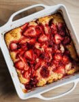 This easy-to-bake strawberry spoon cake lies somewhere between a cake and a cobbler. It bakes up beautifully and harnesses all the juices of ripe summer berries. This recipe is a variation on a classic summer fruit dessert known as "Essie's cobbler."