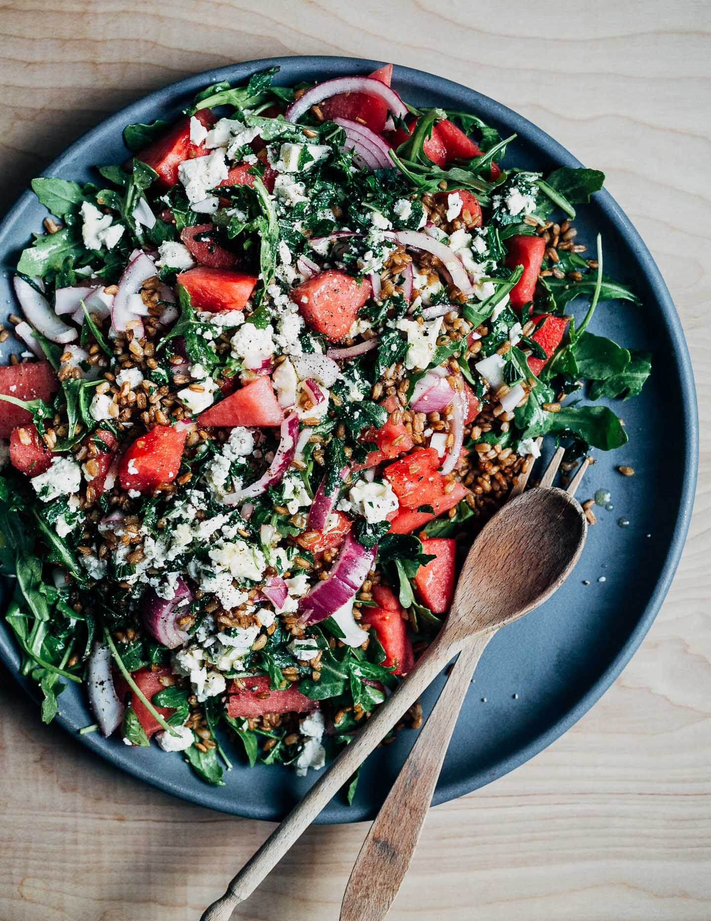 Nutty fried farro and lemony pickled red onions lend savory depth to this spin on the classic watermelon feta salad.