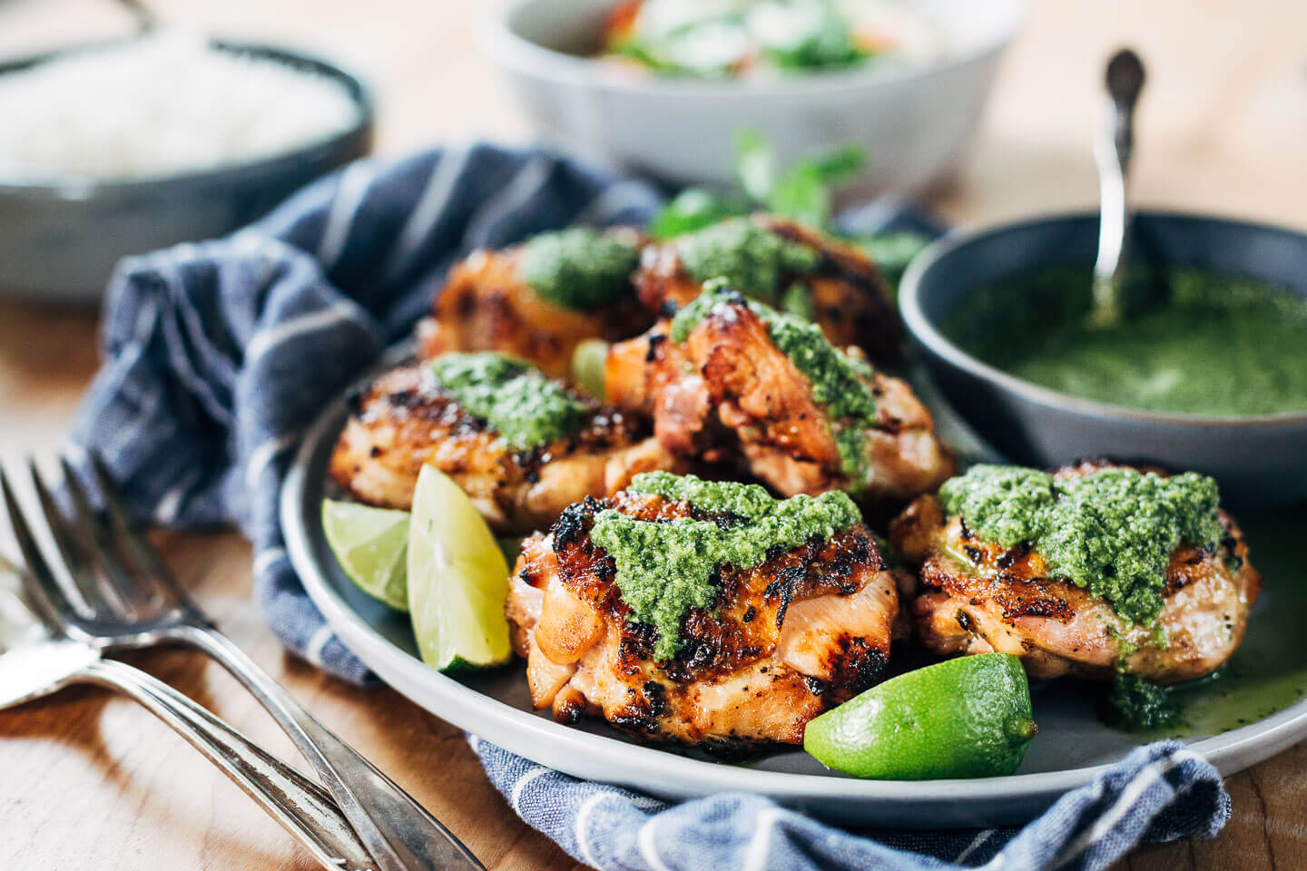 Grilled coconut lime chicken thighs come off the grill with crispy, caramelized skin and just the right amount of tang, sweetness, and spicy heat.