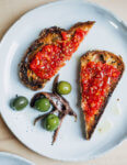 The best way to mark peak tomato season is also the easiest – pan con tomate, aka Spanish-style tomato toast, is simply tomato pulp, good olive oil, and flaky sea salt on toasted bread.