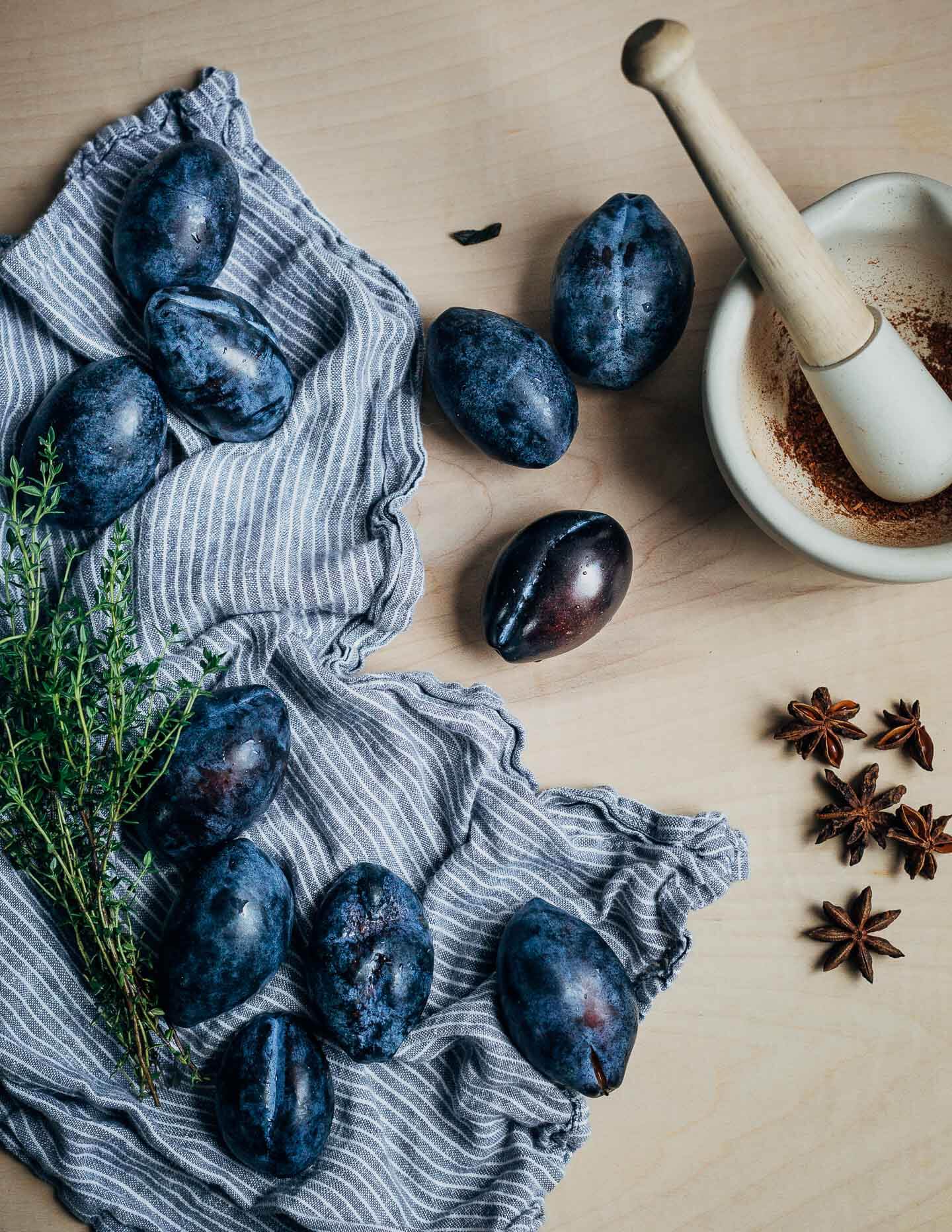 Damson plums, fresh thyme and star anise for a plum galette. 