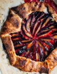 A beautifully rustic, of-the-moment Damson plum galette with fresh thyme, ground star anise, and a flaky all-butter crust.