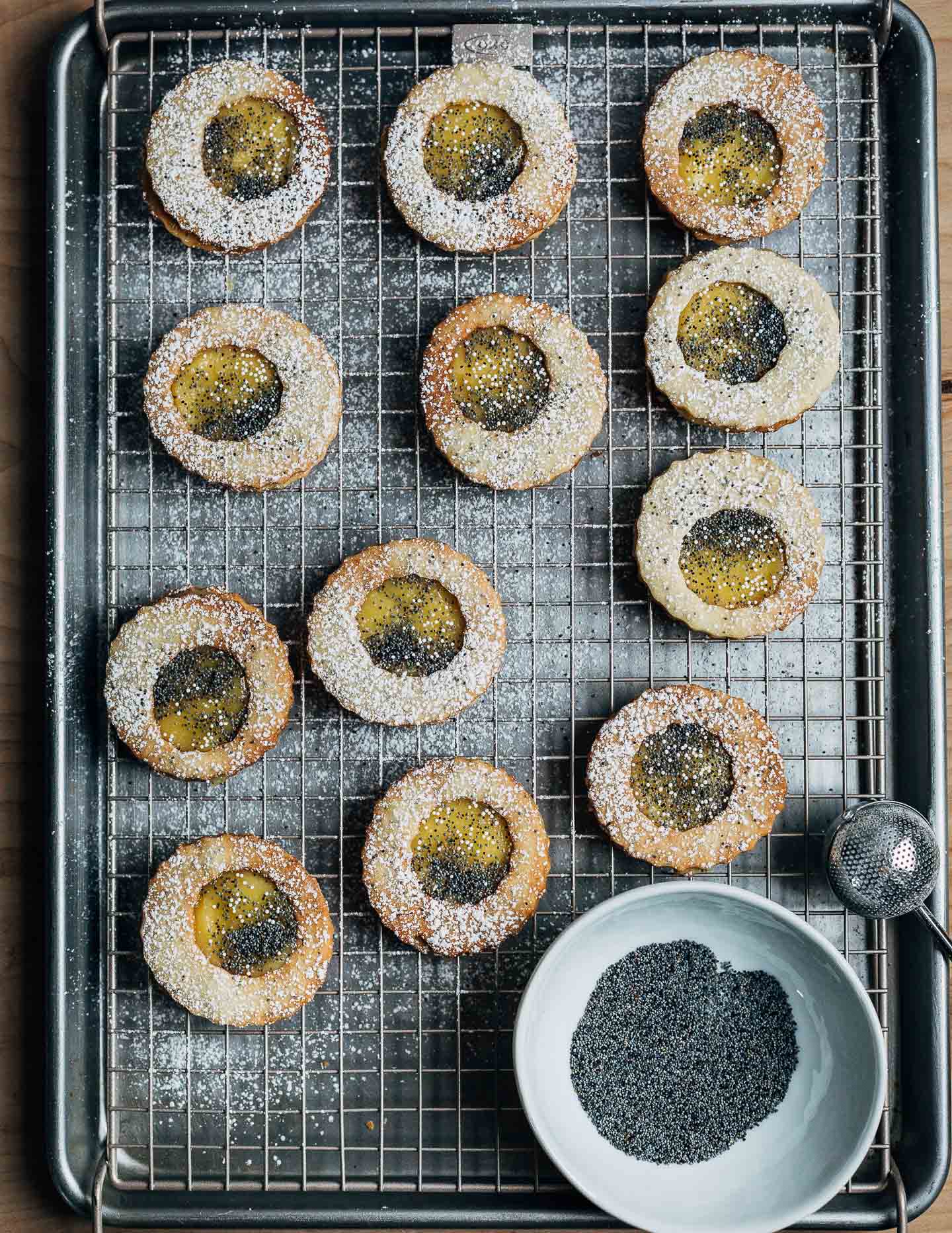 Buttery lemon poppy seed cookies with light, wonderfully bright Meyer lemon curd are a delightful holiday treat.
