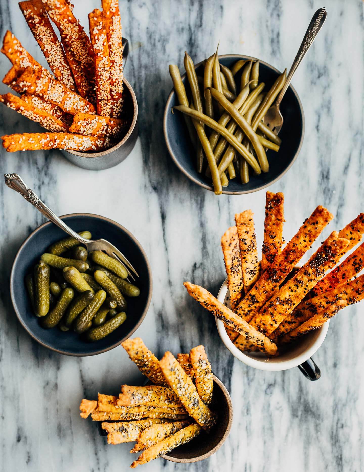 These irresistibly delicious seeded cheese straws have it all: vivid color, unexpected flavor, buttery texture, and the nutty crunch of your favorite seeds. Mix and match flavors and seeds to create your own!