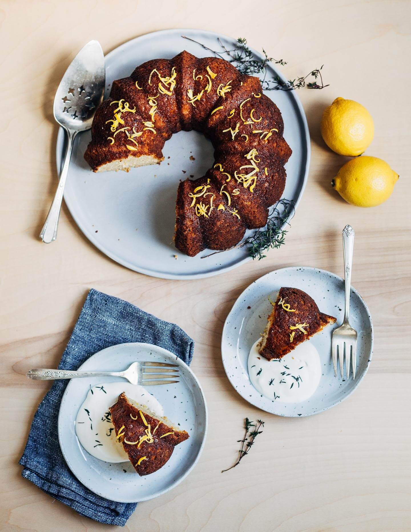 A rustic spelt and olive oil lemon bundt cake with lots of bright lemon flavor and a tender, springy crumb.