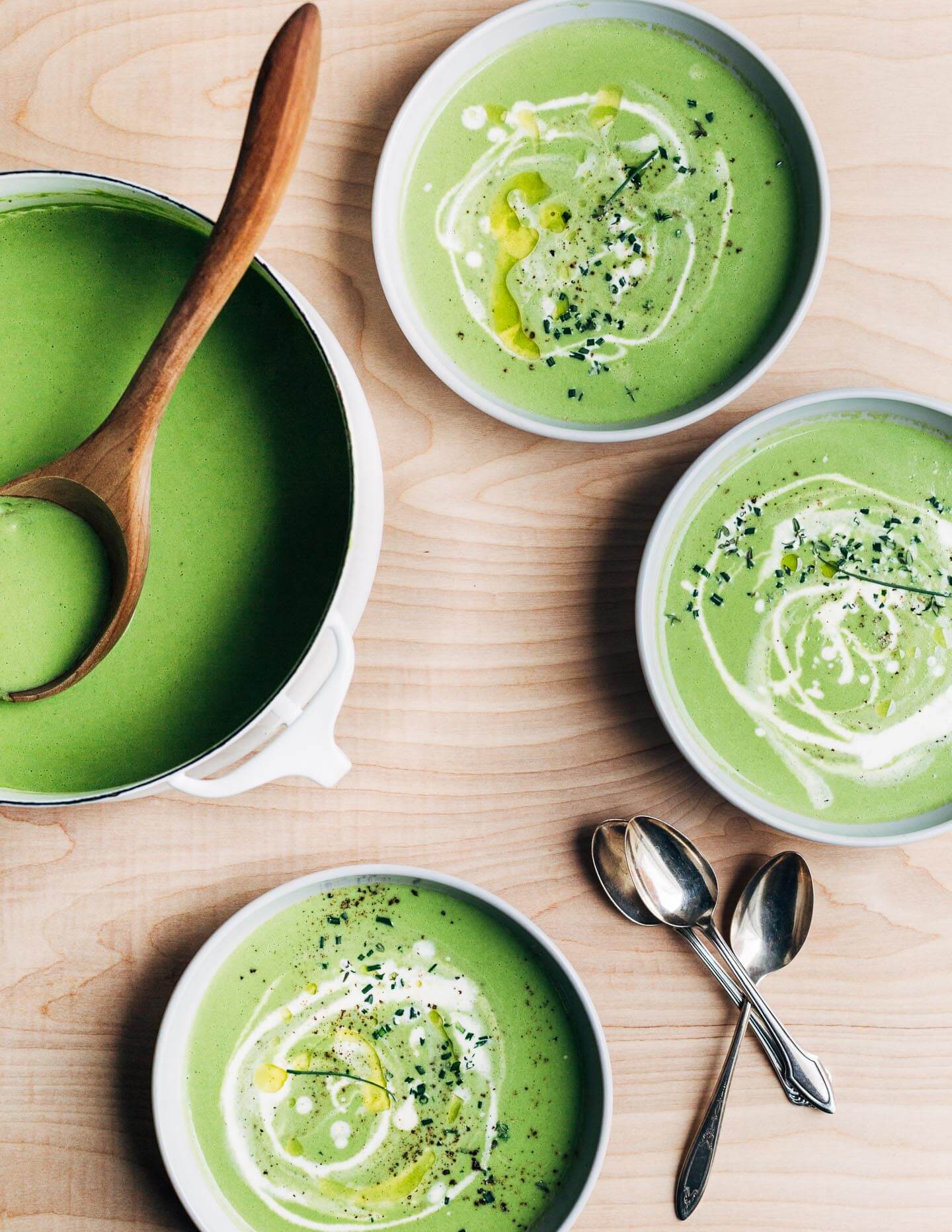 Serving and garnishing the cream of asparagus soup