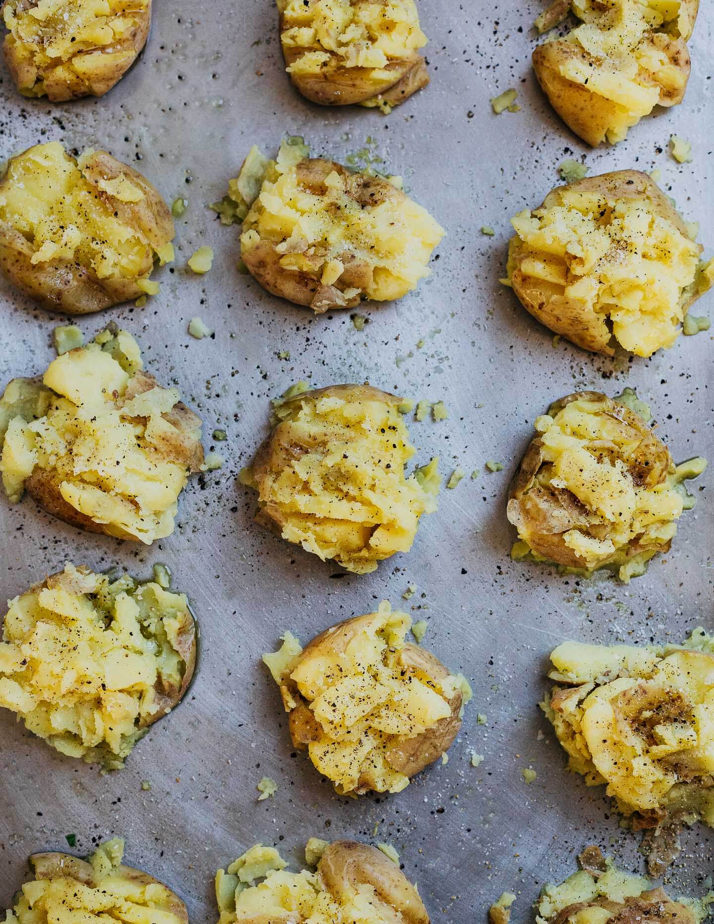 Smashed Yukon Gold potatoes, ready to bake. 