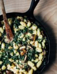A weeknight recipe with showoff vibes, this creamy mushroom and greens gnocchi features umami-rich mushrooms, tender collard greens, and pillowy gnocchi in a velvety Parmesan and cream sauce.