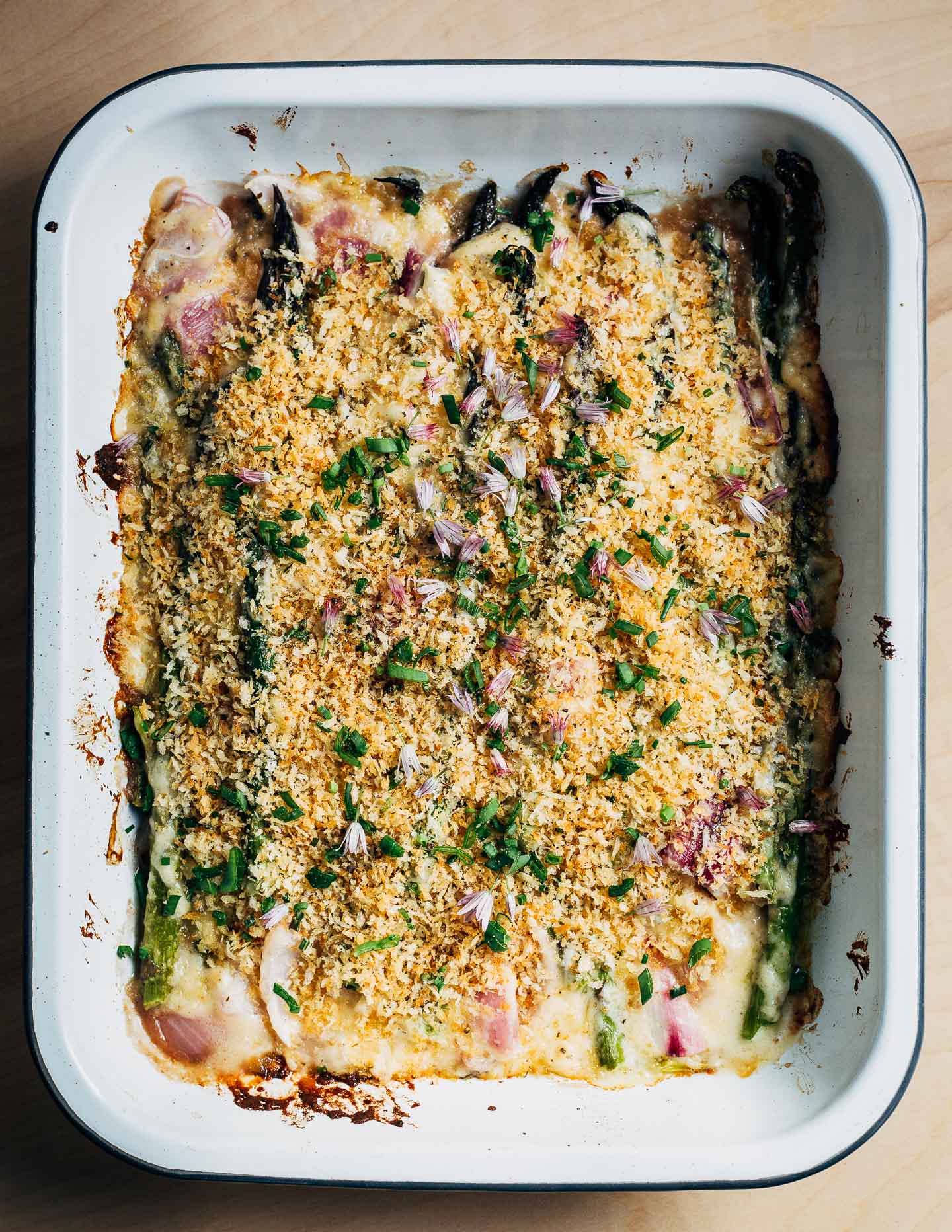 Asparagus gratin in an enamelware baking dish