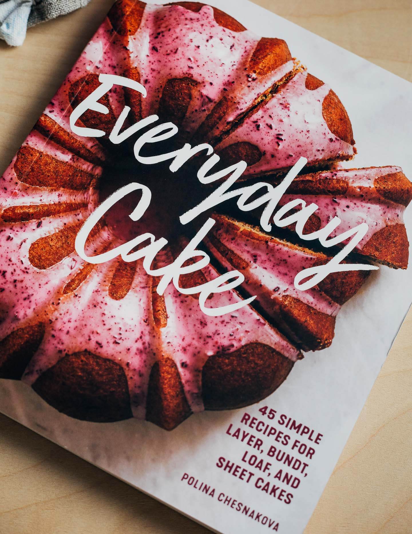 A copy of the new cookbook 'Everyday Cake' on a table. 