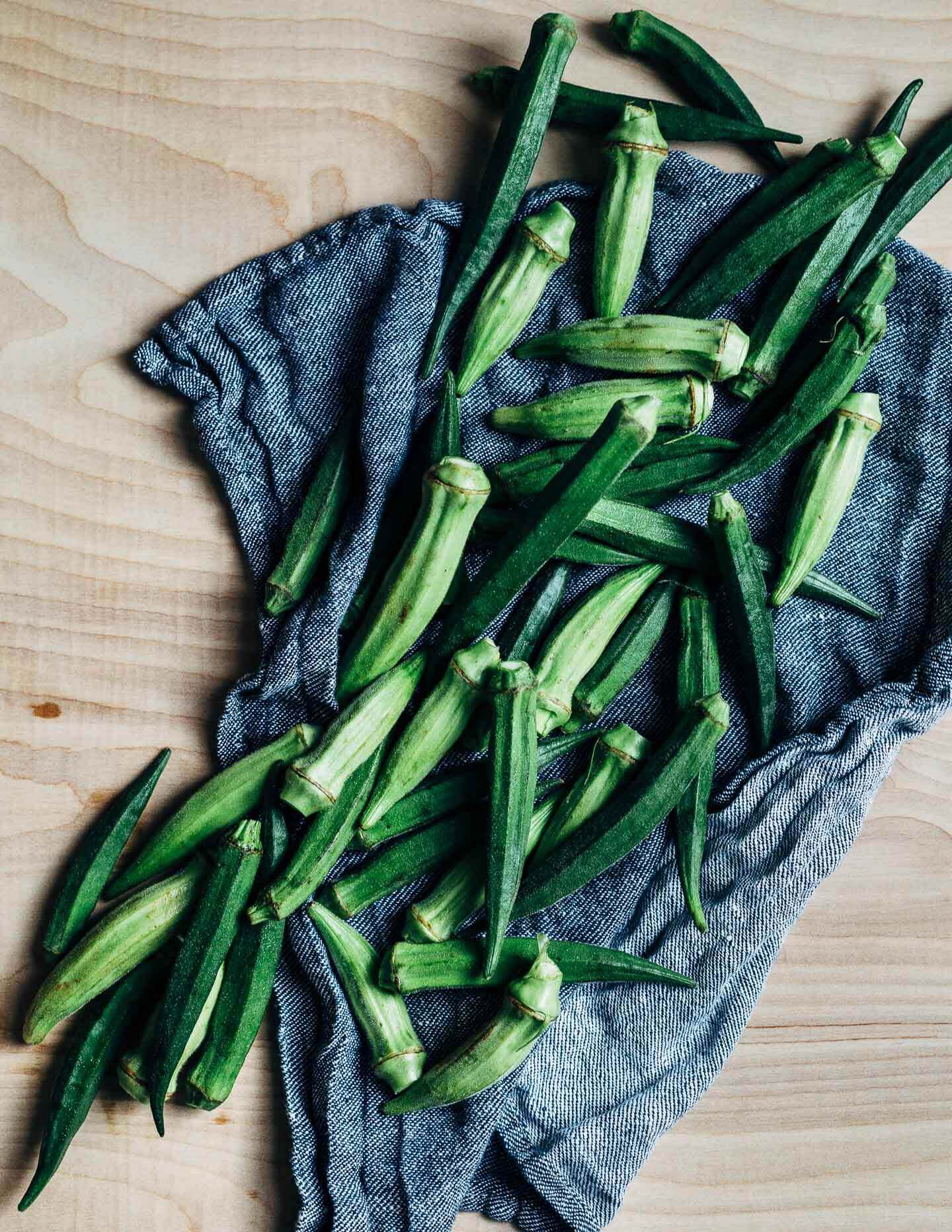 Okra on a dish towel. 