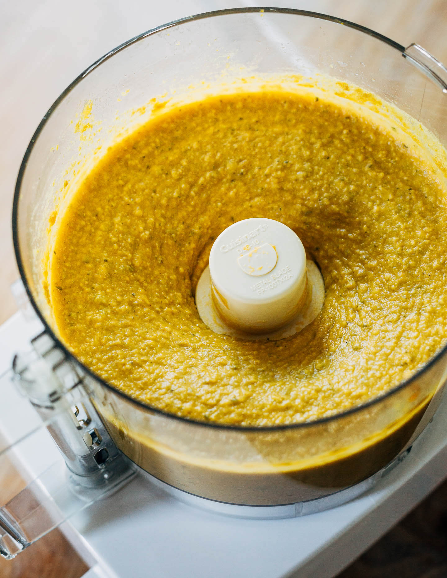 Pureed butternut squash queso in the food processor.