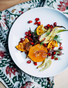A plate with a composed orange and fennel salad.