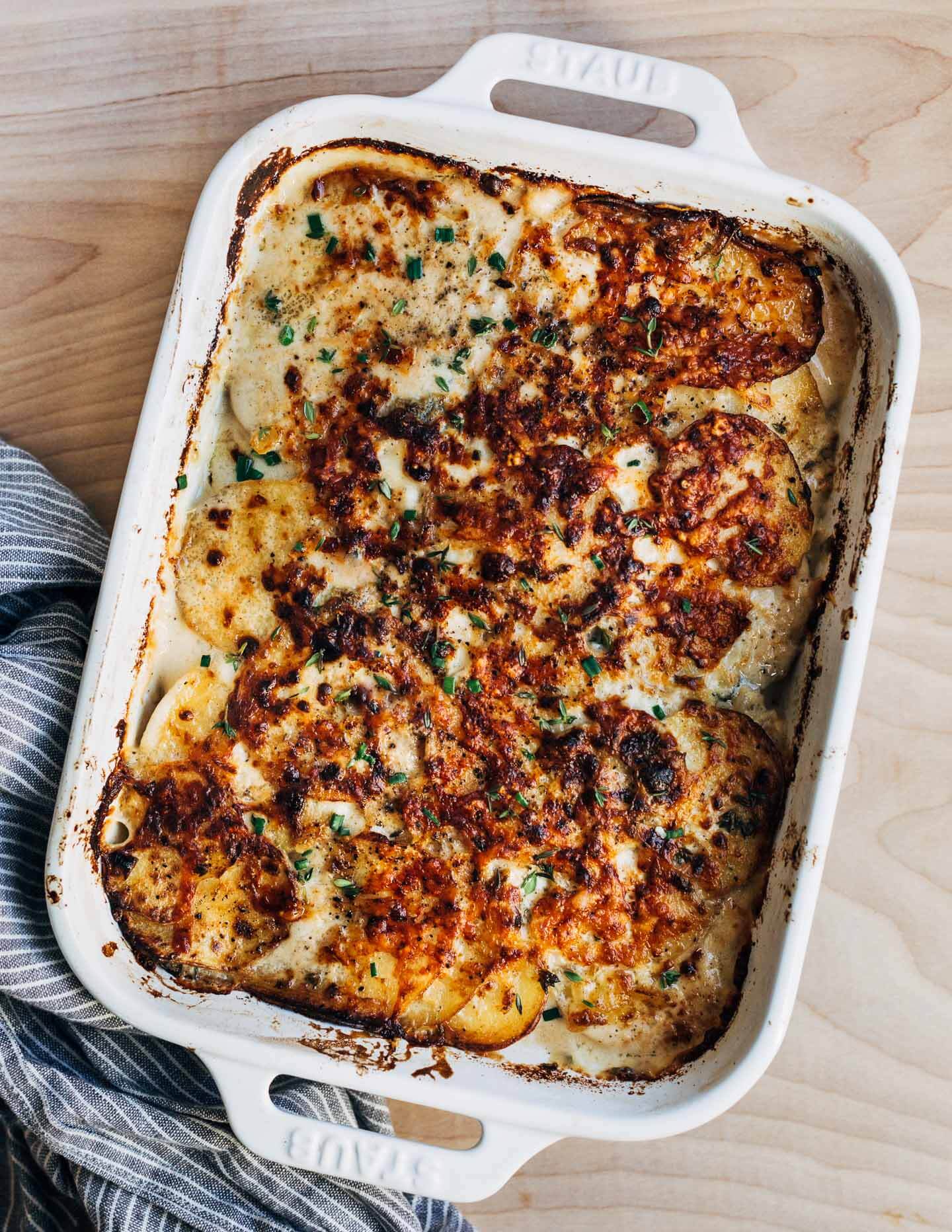 Scalloped potatoes in a baking dish, just out of the oven. 